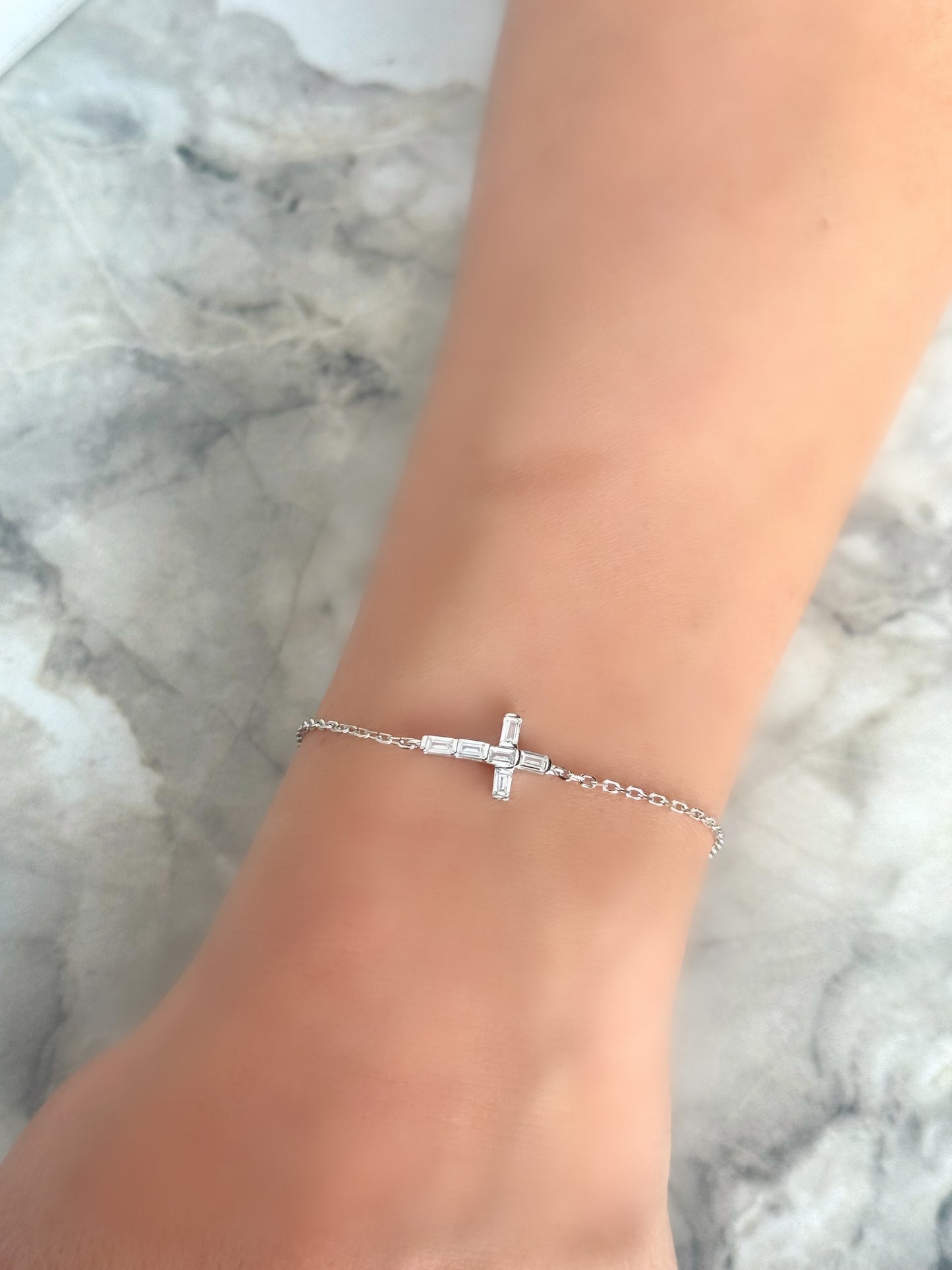 Cross Design Bracelet With Baguette Stones