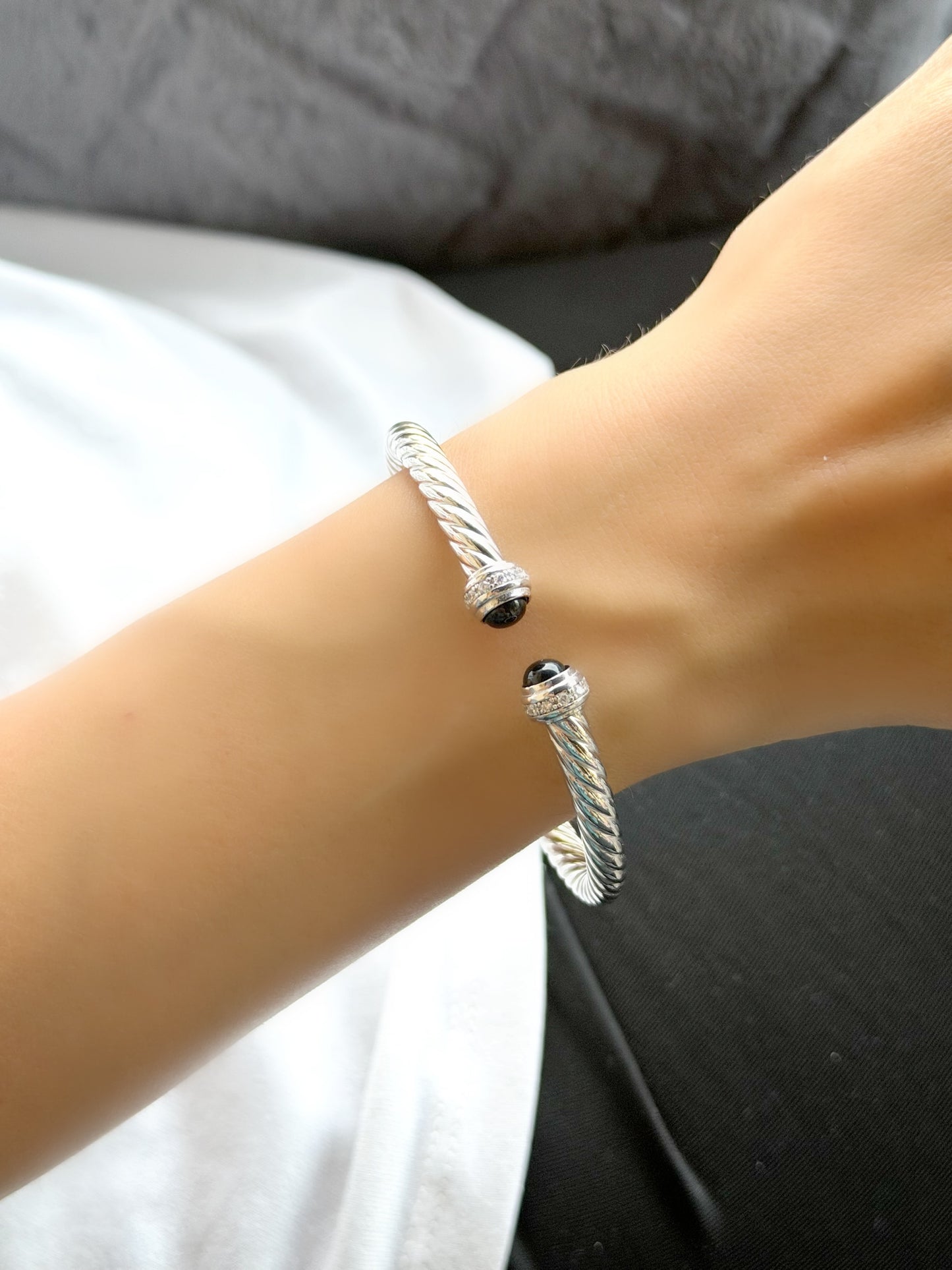 Twisted Design Bangle Bracelet With Black Stone