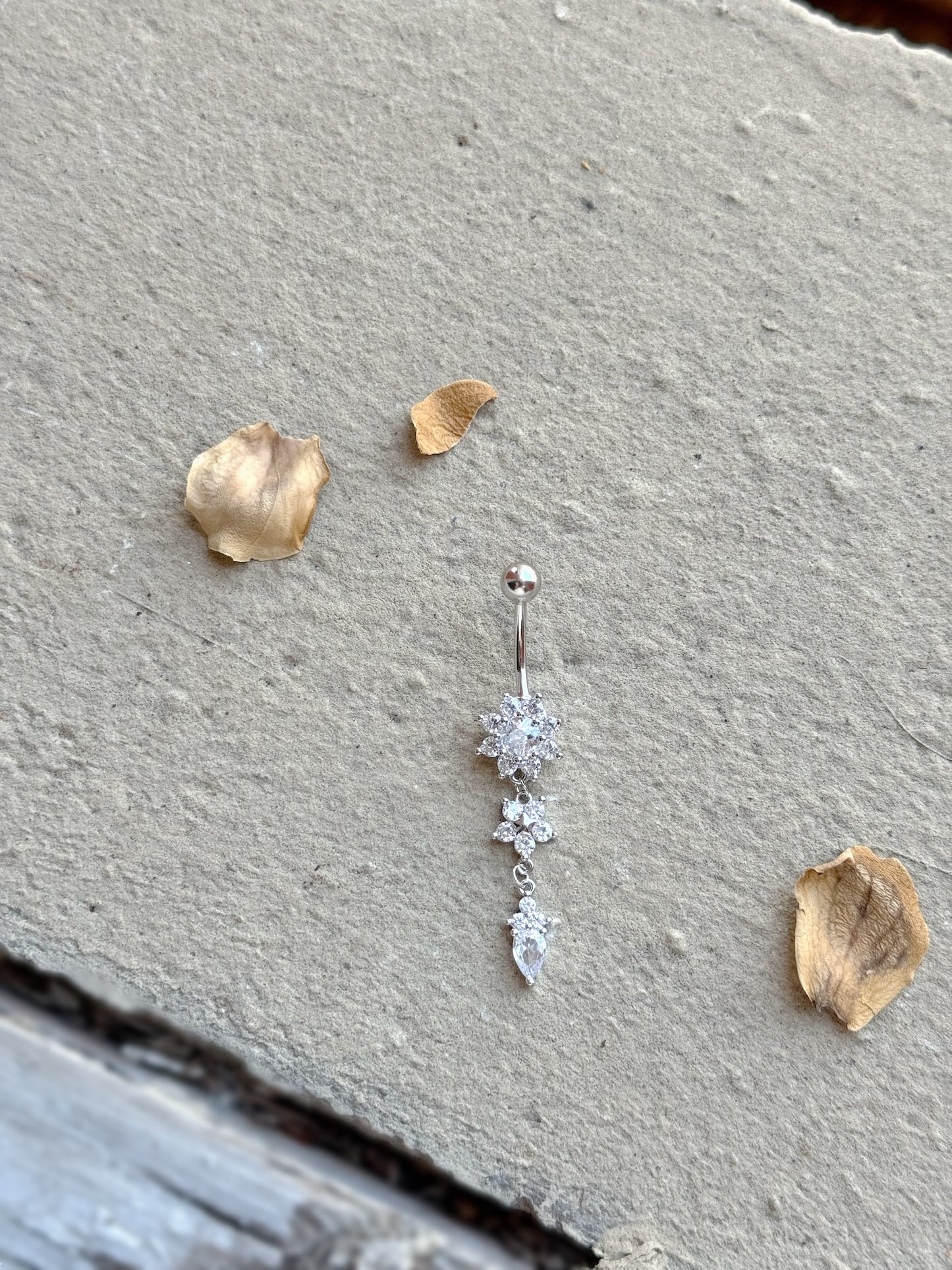 Two Flowers With Tear Drop Design Belly Piercing