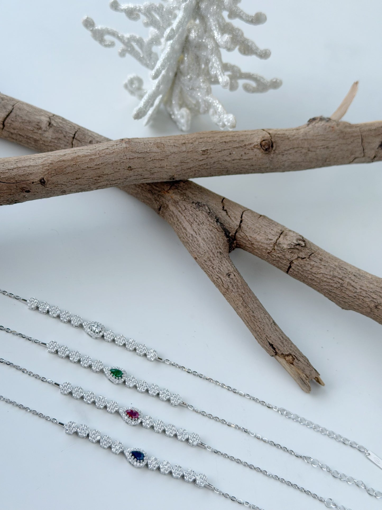 Elegant Tear Drop Design Bracelet Available In Three Colors