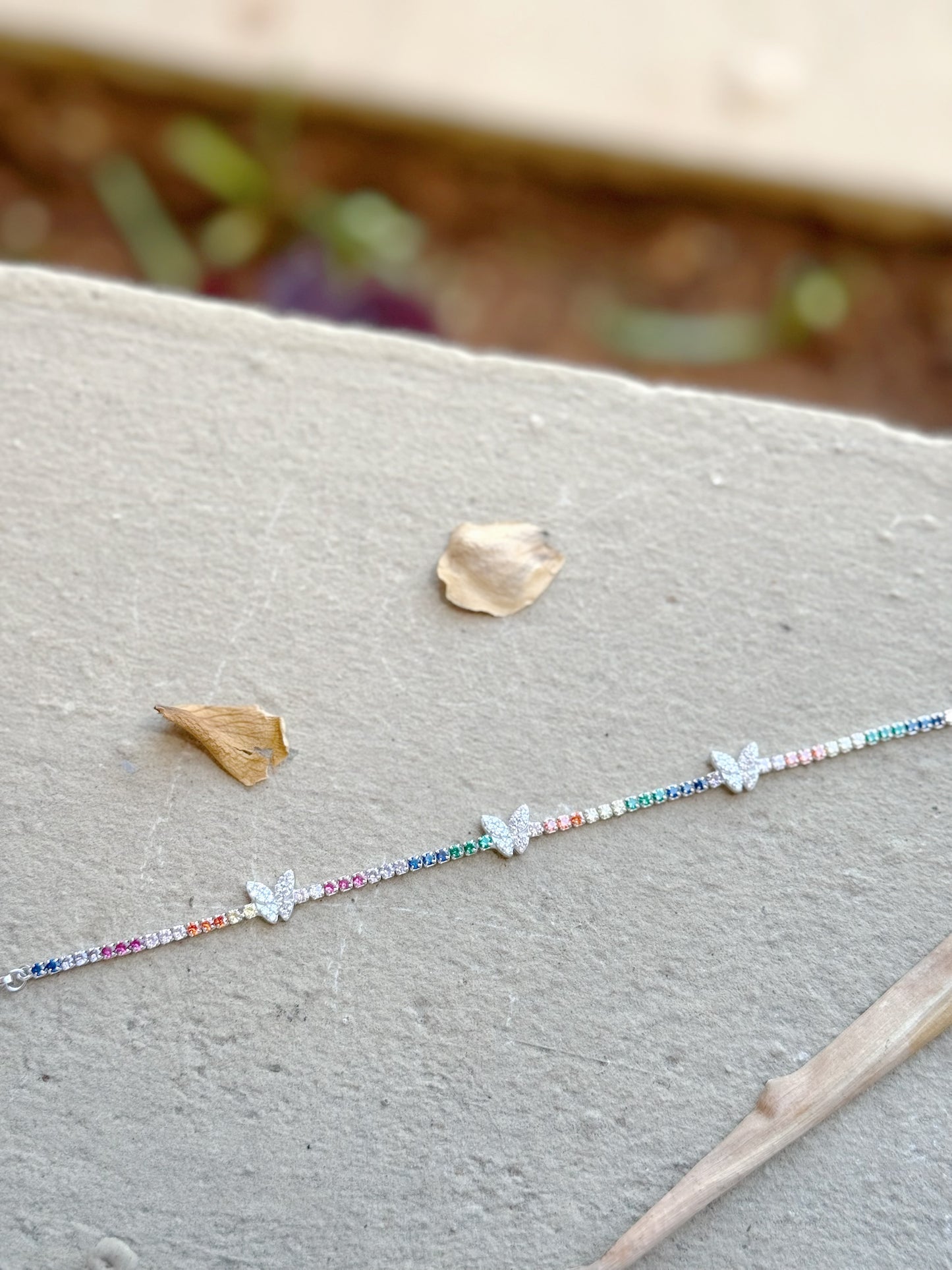 Rainbow Tennis Bracelet With Three White Butterfly Design