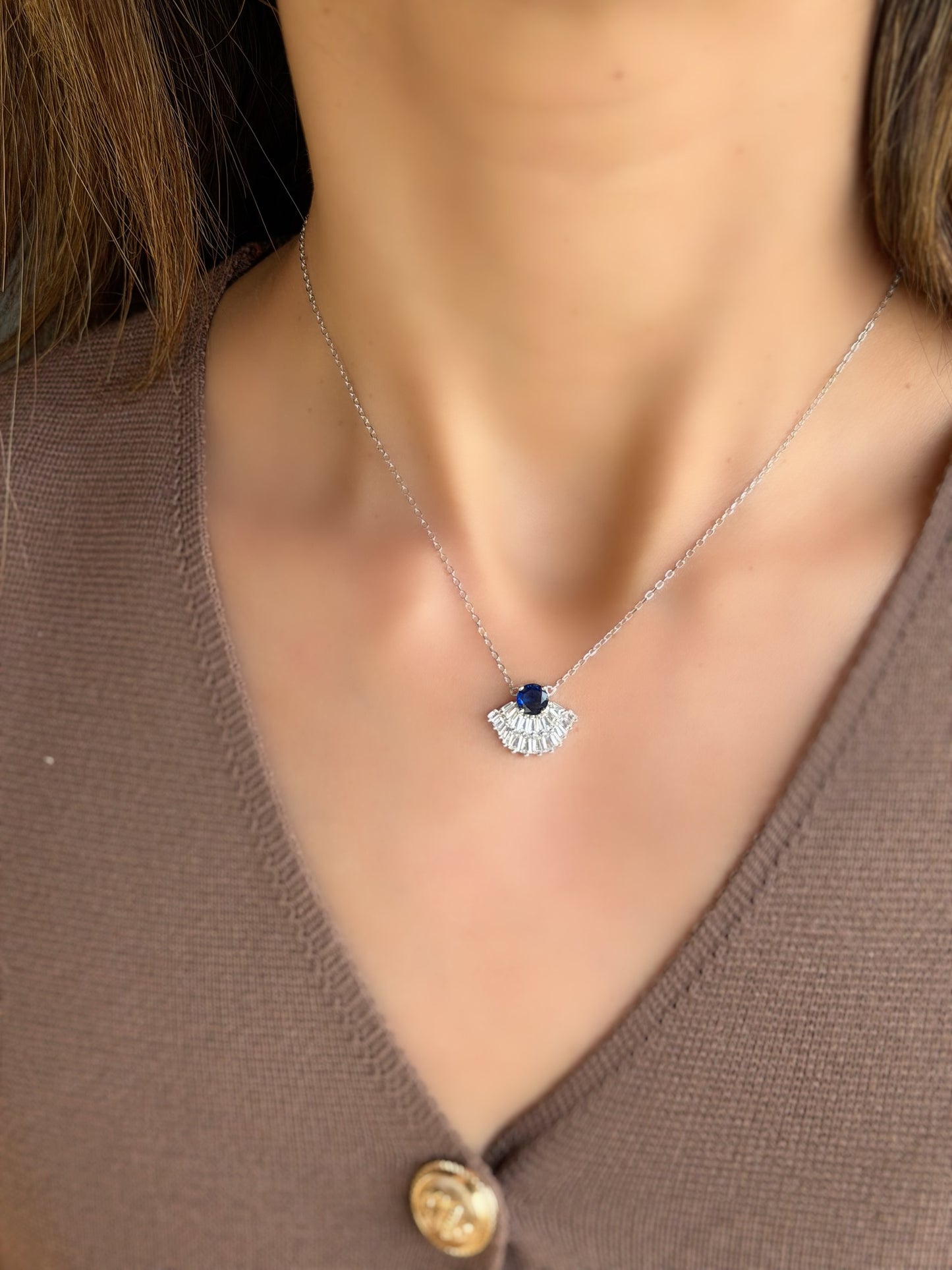 Fan Shaped Design With Blue Stone