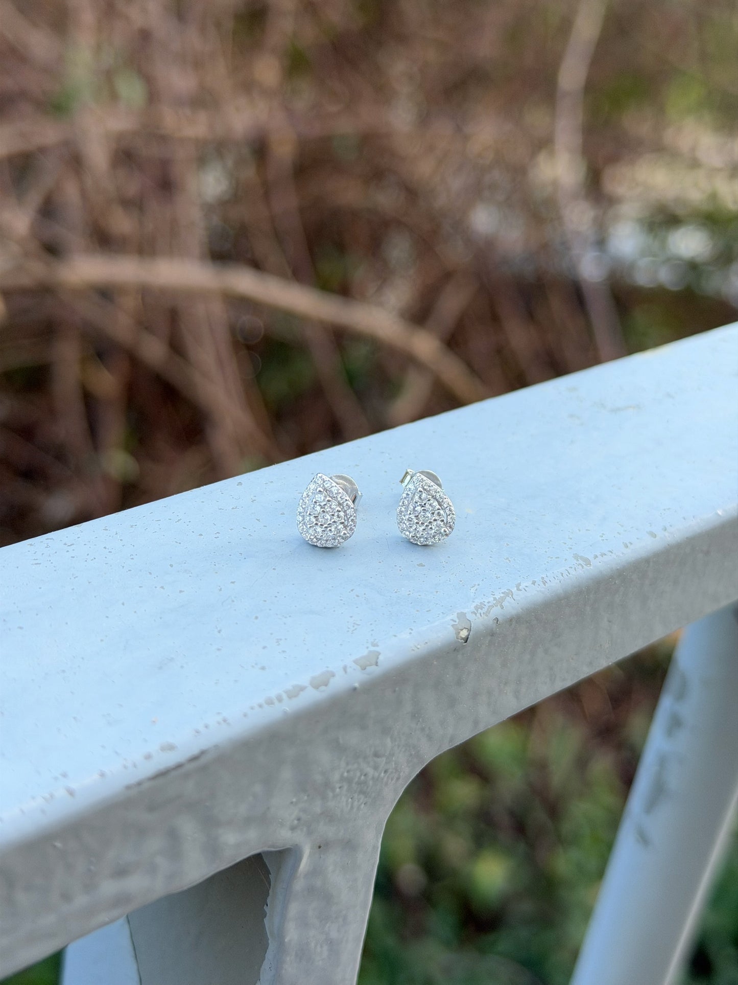 Tear Drop Design Earrings With Small White Stones